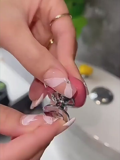 Sercowaty przycisk do spłukiwania toalety – uroczy wydłużacz